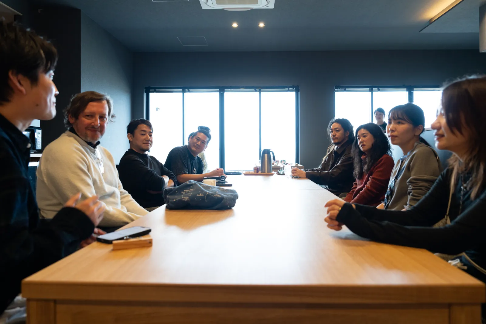 Designers gathering around the table